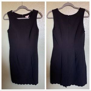 Black shift dress with scallop hem